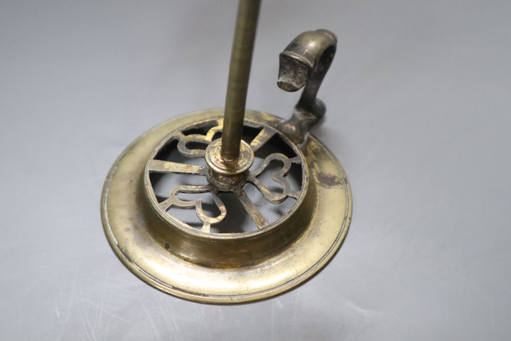 A 19th century brass waxjack, with attached extinguisher, 14cm high